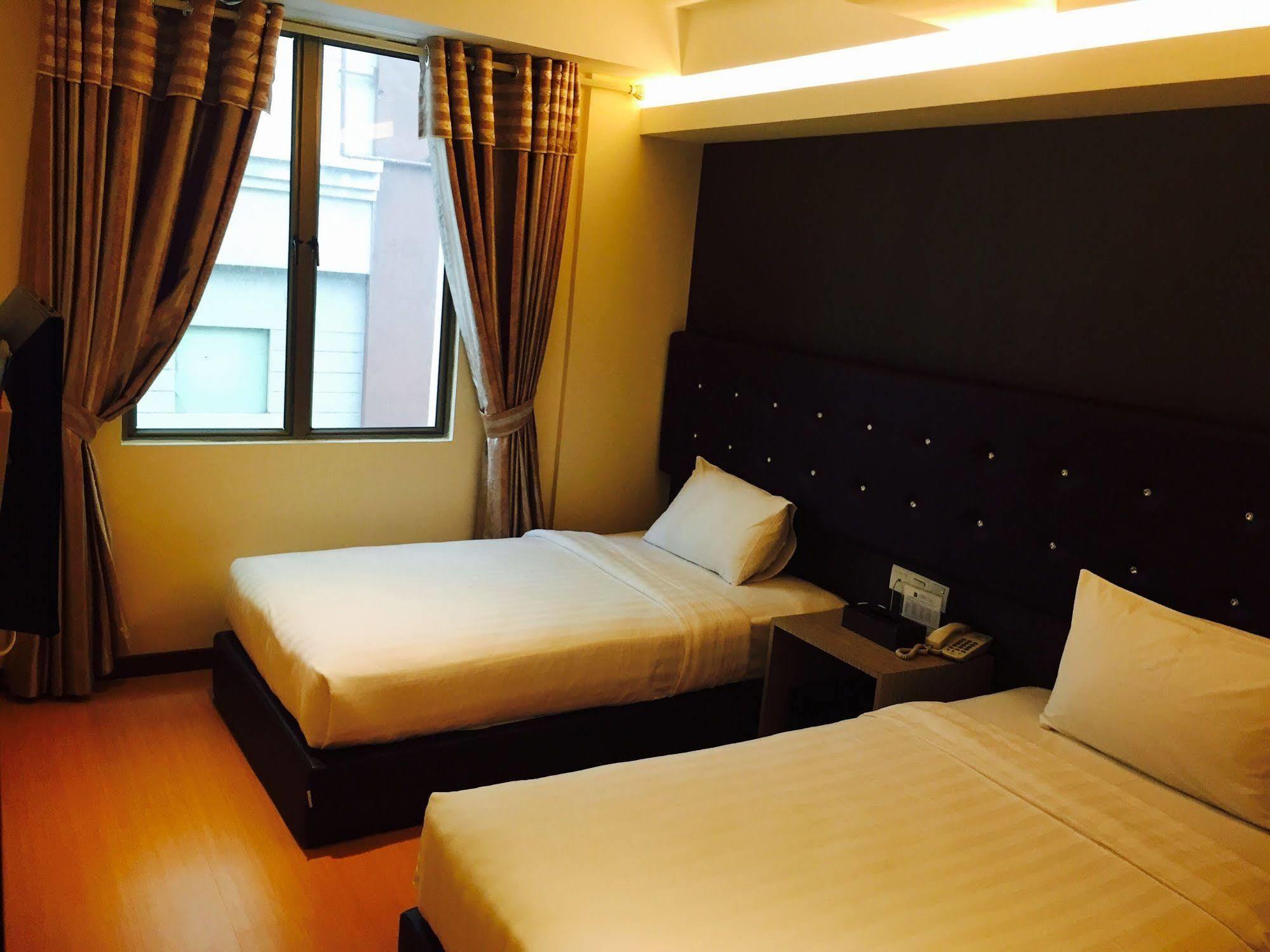 Ease Hotel Kota Kinabalu Bagian luar foto