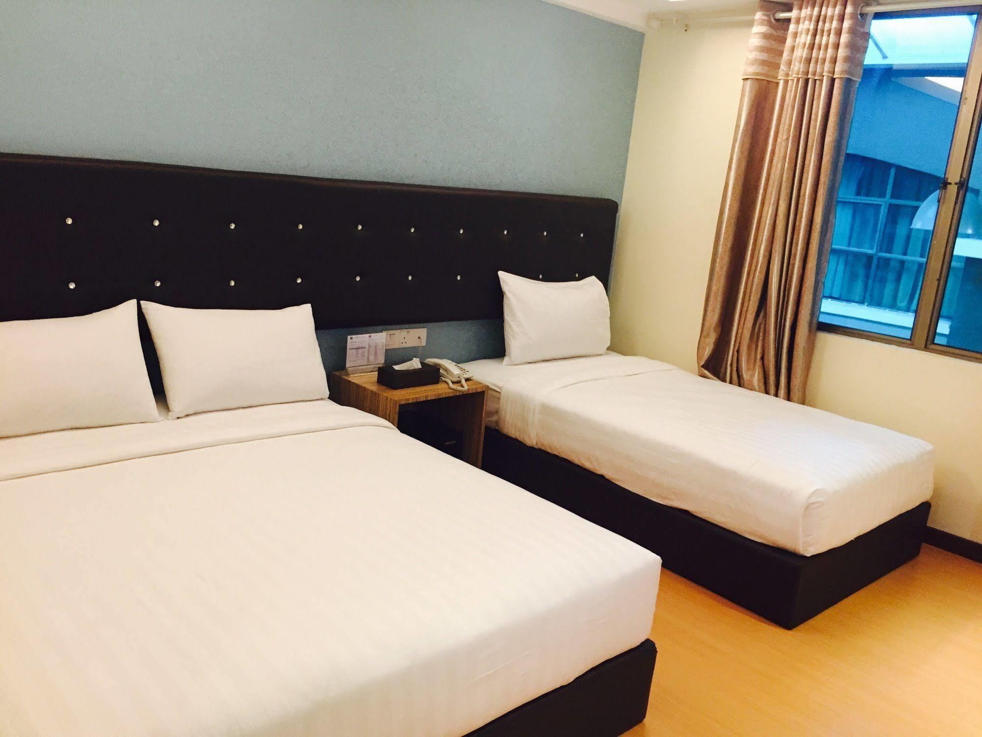 Ease Hotel Kota Kinabalu Bagian luar foto